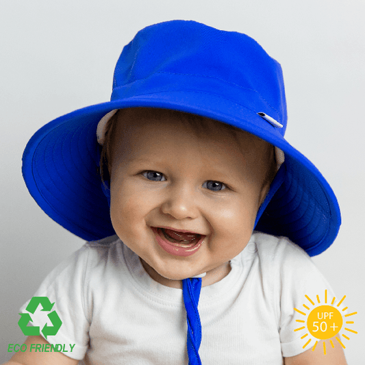 Royal blue kids bucket hat with wide brim and breakaway chin strap, made from lightweight recycled fabric for everyday sun protection.