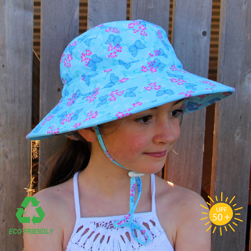 Butterfly-patterned children’s sun hat made from recycled rPET fabric, shown with adjustable back toggle and moisture-wicking lining