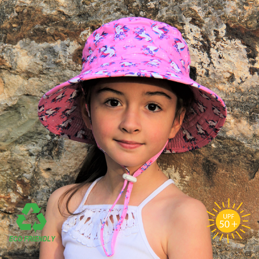 Kids bucket sun hat with magical unicorn print, crafted from recycled rPET fabric, offering UPF 50+ sun protection and a wide anti-flop brim